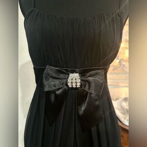 Elegant Black Draped Cocktail Party Dress with Crystal Bow Embellishments